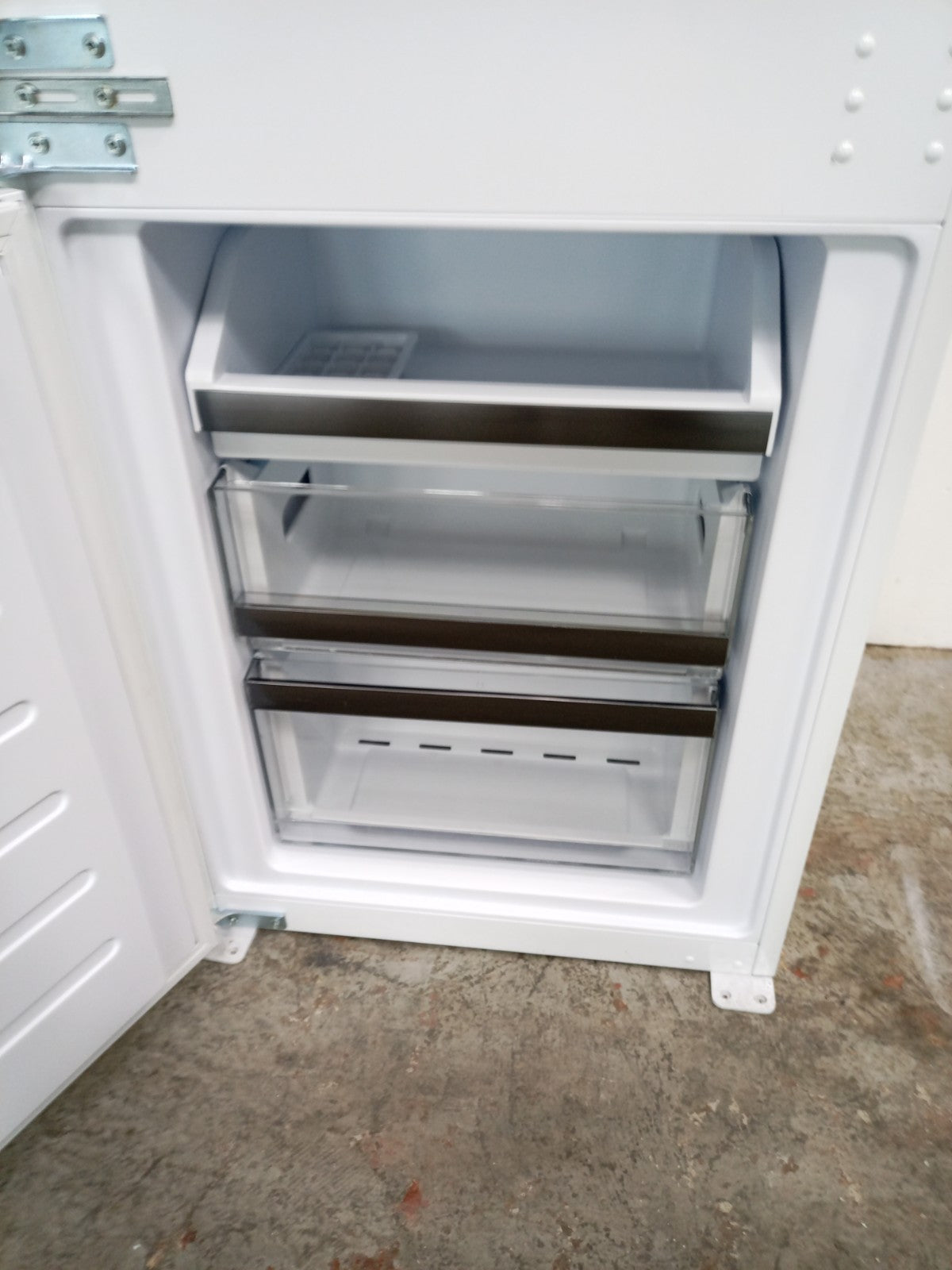 New Graded Haier HBW5518DK-1  70/30 Integrated Fridge Freezer RRP£799 Y1